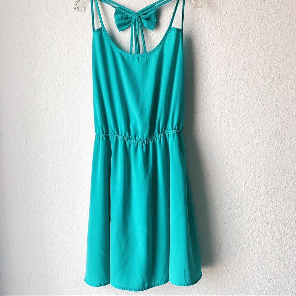 aqua flowy dress with bow accent